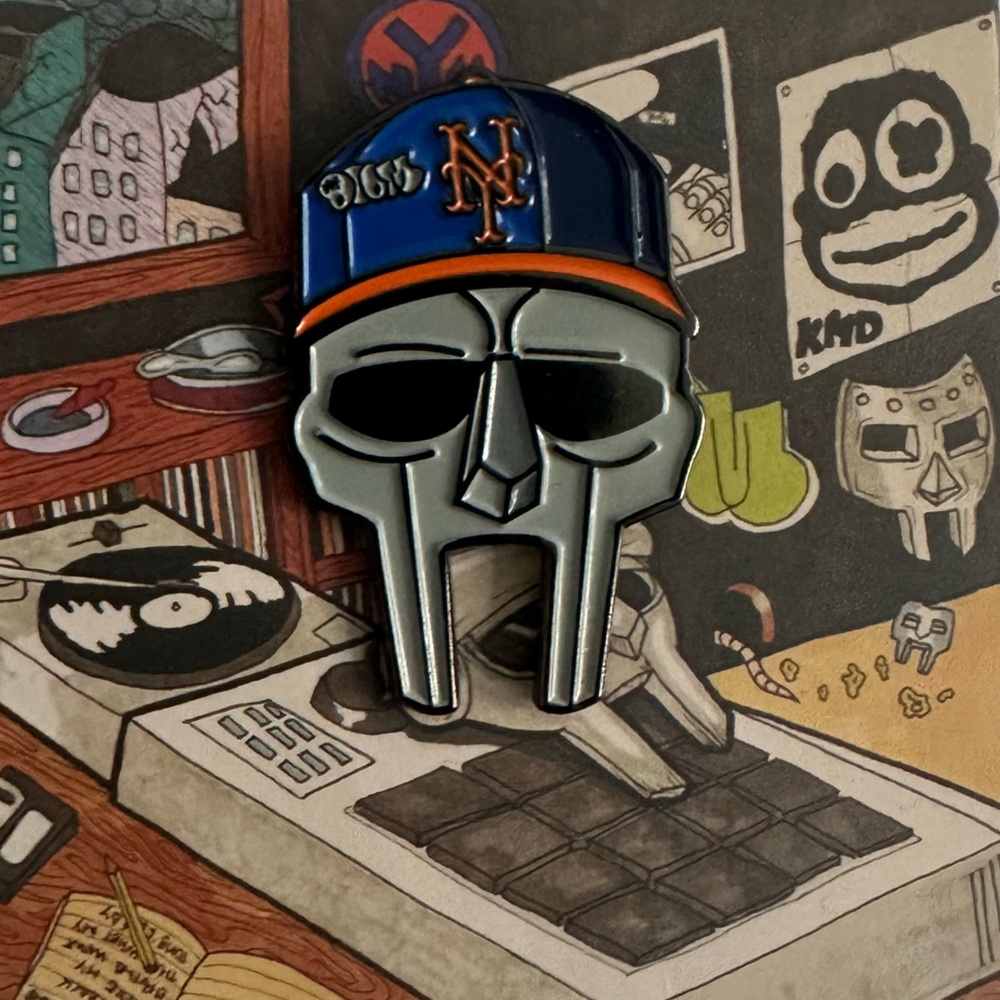 Metal Mask Enamel Pin with Blue and Orange Hat
